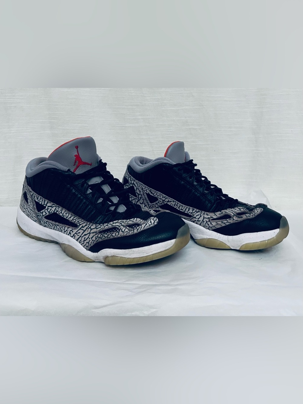 Air Jordan 11 Retro Low IE Men's Black/Grey Sneakers with Red Jumpman Accents